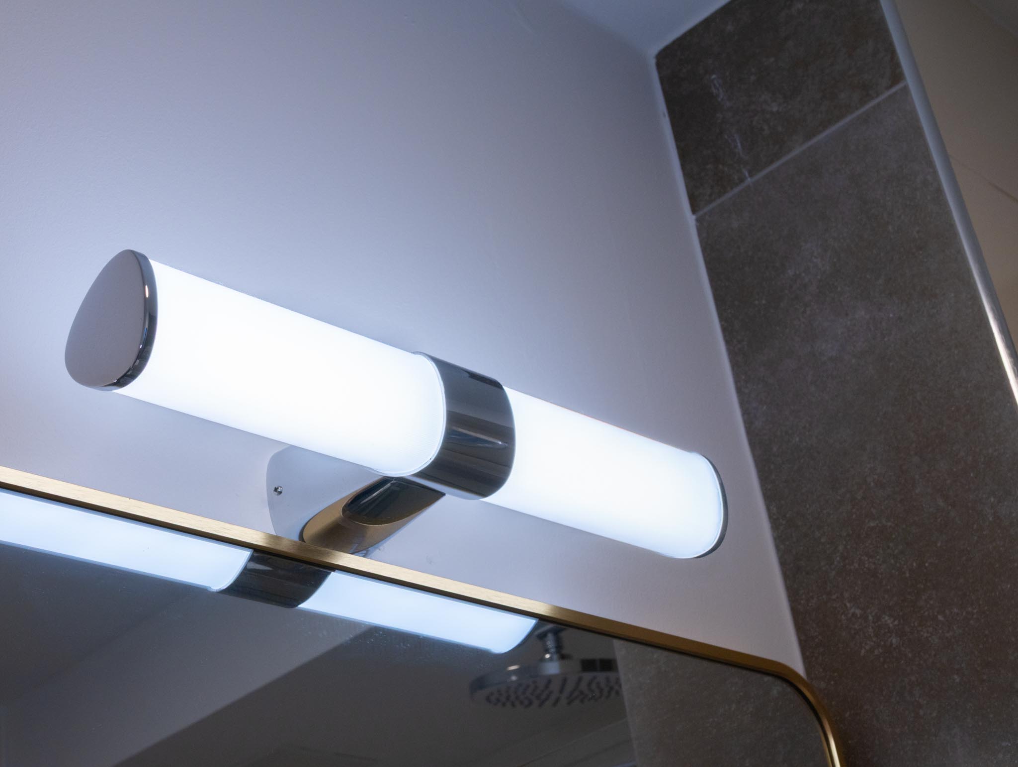 Badezimmer – Beleuchtung im FairSchlafen Boutique Hotel